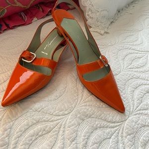 Orang patent slings. Beautiful low heeled shoes in gently used condition.